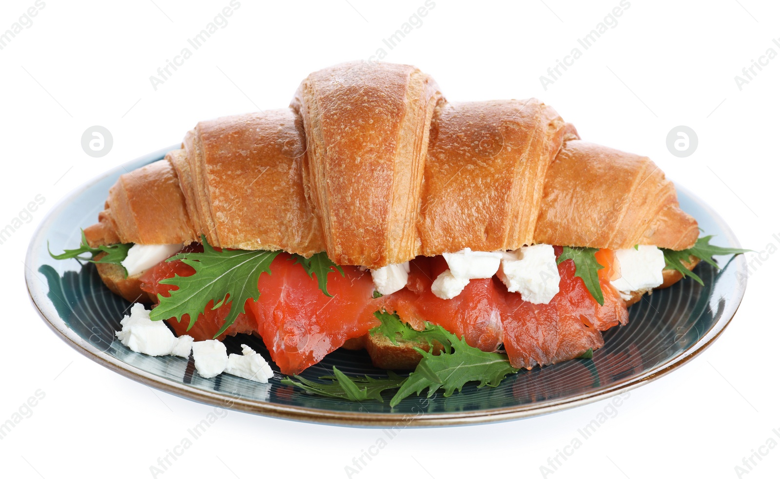 Photo of Plate with tasty croissant sandwich isolated on white