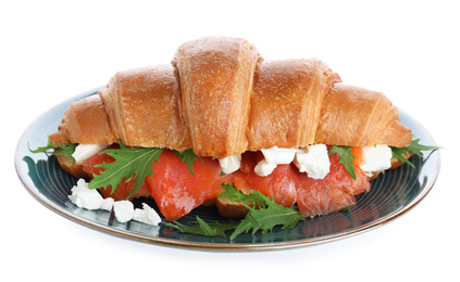 Photo of Plate with tasty croissant sandwich isolated on white