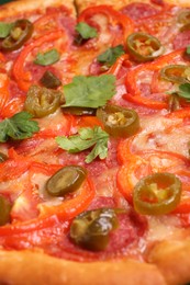 Photo of Delicious hot pizza Diablo as background, closeup