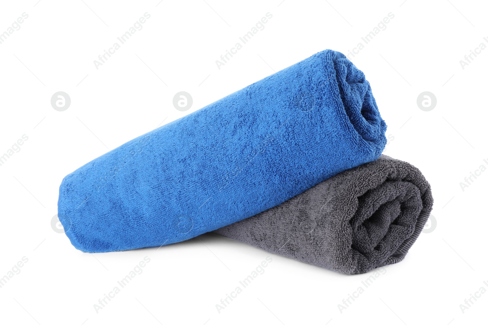 Photo of Rolled soft terry towels isolated on white