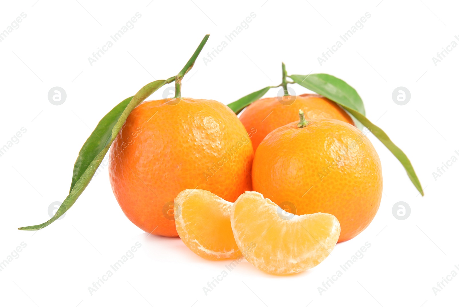 Photo of Tasty ripe tangerines with leaves on white background