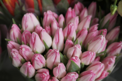 Beautiful pink tulips on blurred background, closeup. Floral decor