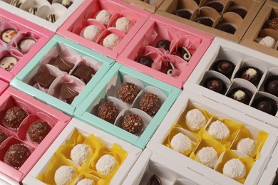 Many delicious candies in boxes. Production line