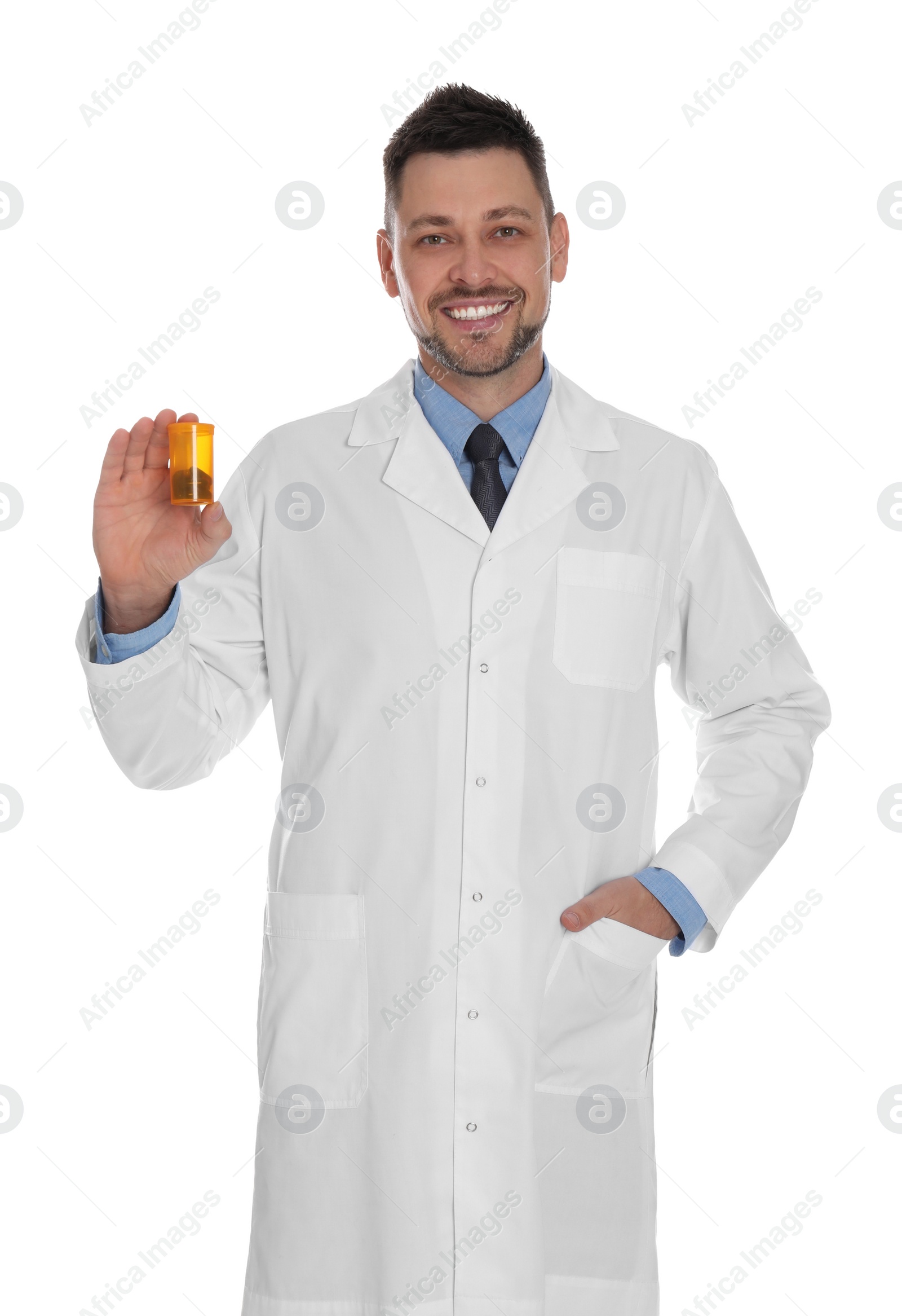 Photo of Professional pharmacist with pills on white background