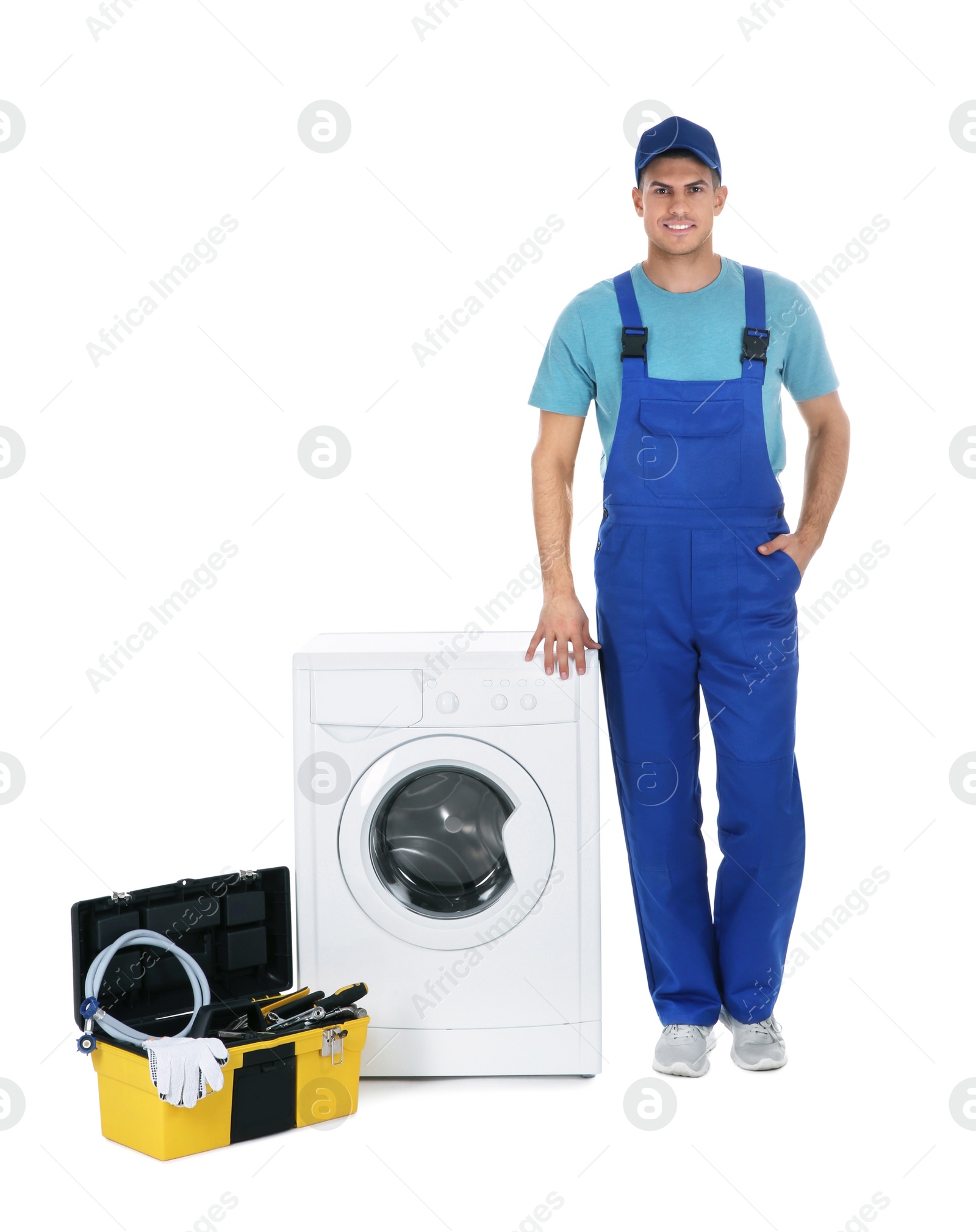 Photo of Repairman with toolbox near washing machine on white background