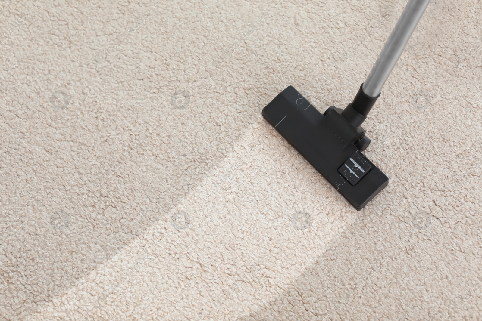 Photo of Vacuum cleaner on carpet