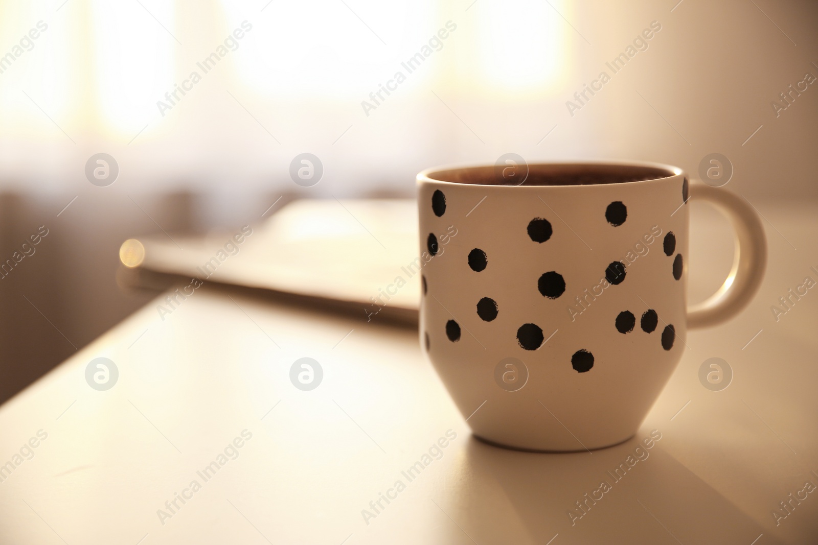 Photo of Cup of hot drink on table, space for text. Lazy morning