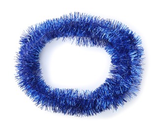 Photo of Shiny blue tinsel isolated on white, top view
