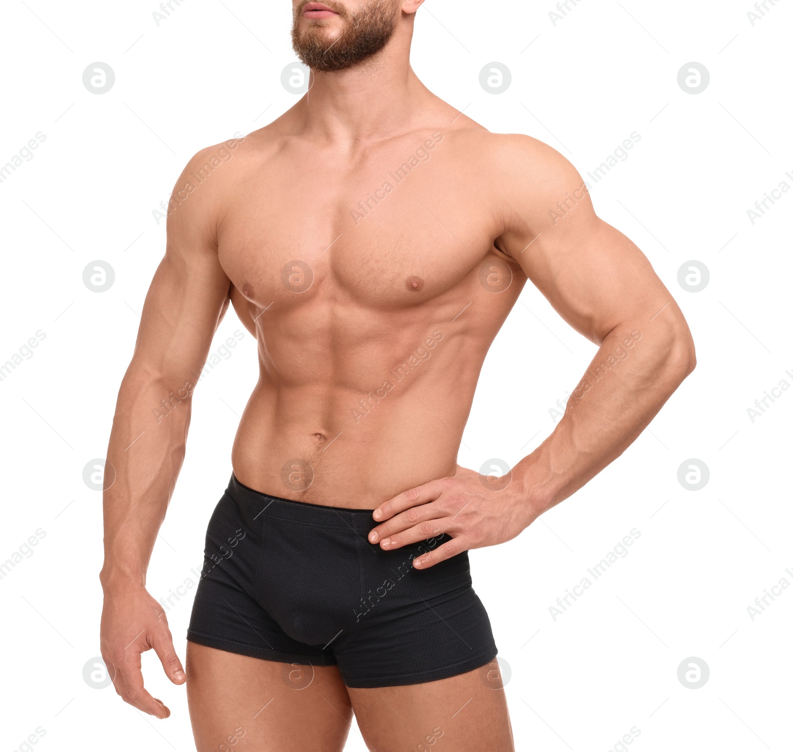 Photo of Muscular man showing abs isolated on white, closeup. Sexy body