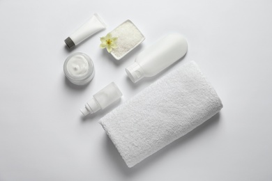 Photo of Flat lay composition with cosmetic products on white background