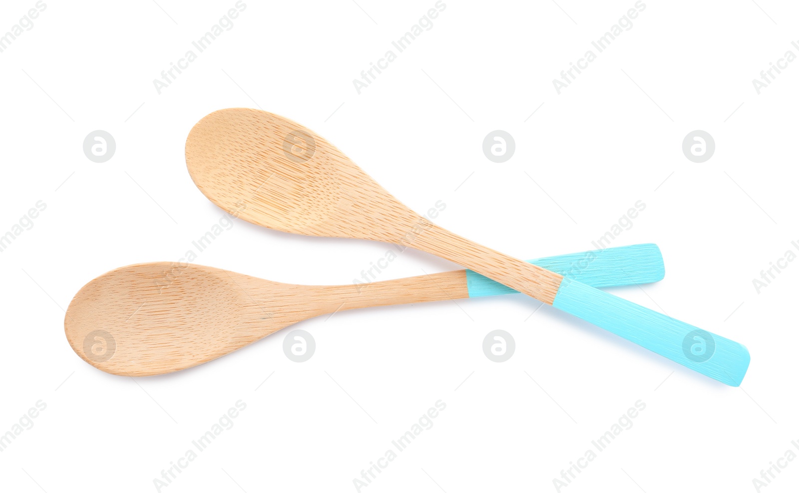 Photo of New clean wooden spoons isolated on white, top view