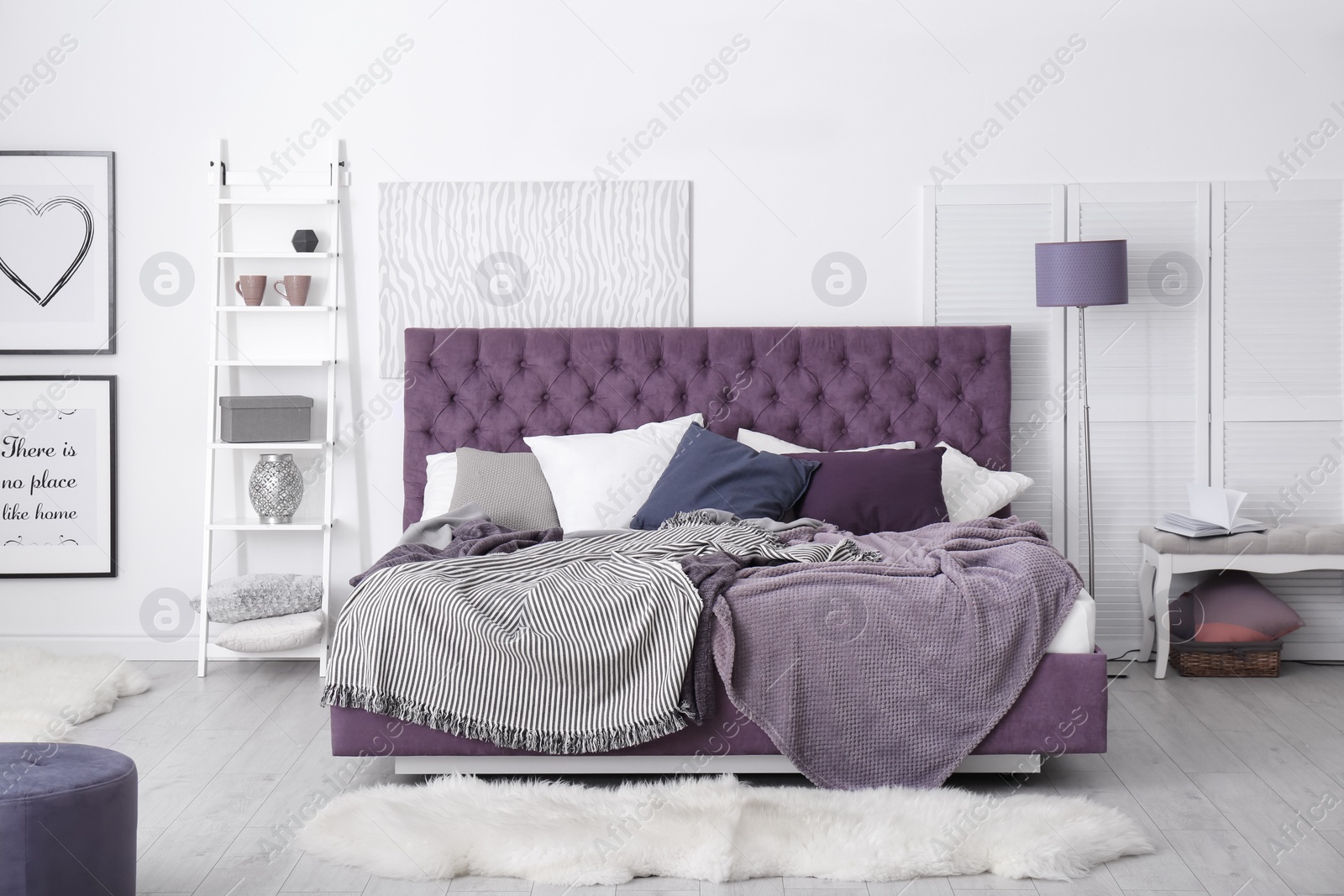 Photo of Bedroom interior with comfortable soft bed