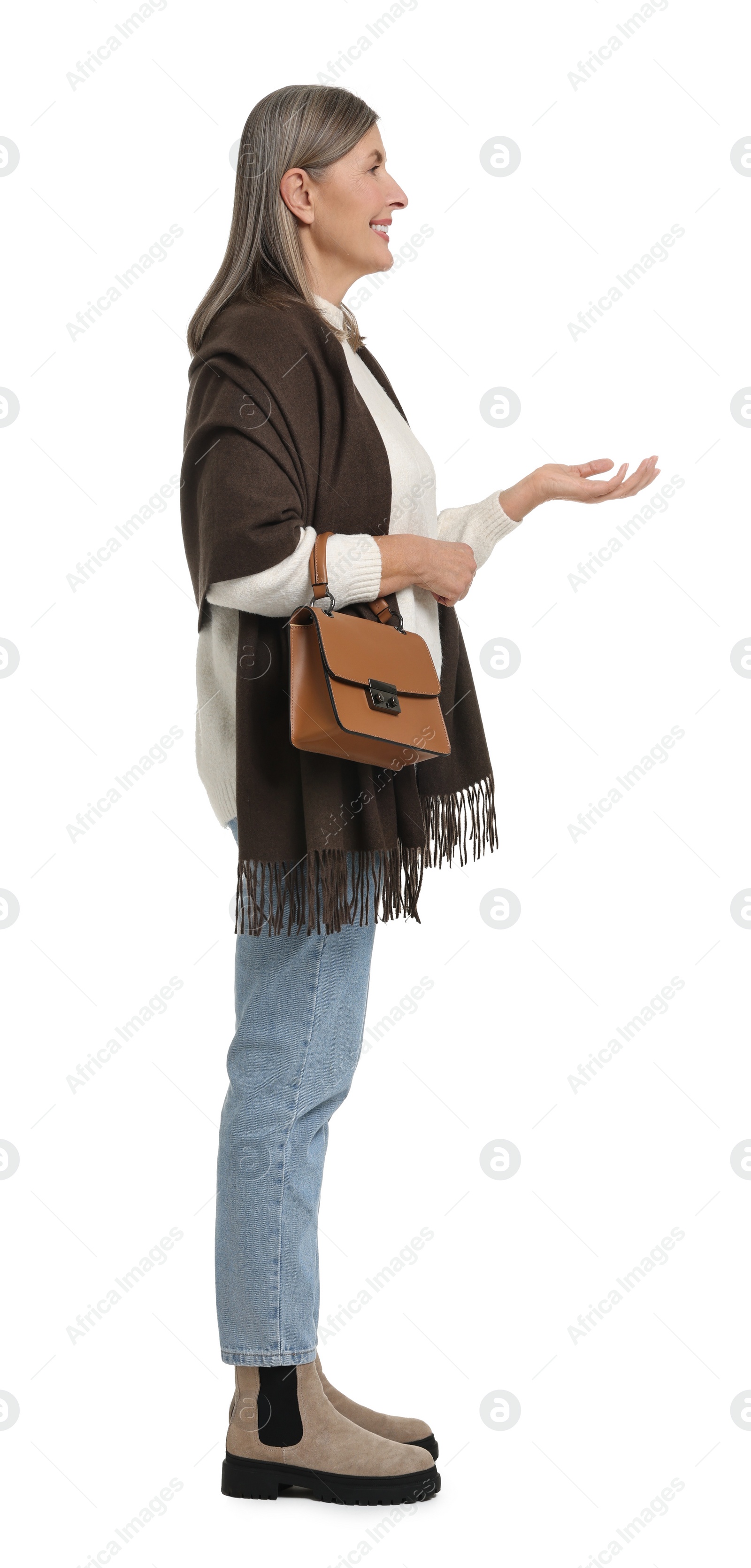 Photo of Full length portrait of senior woman with bag on white background