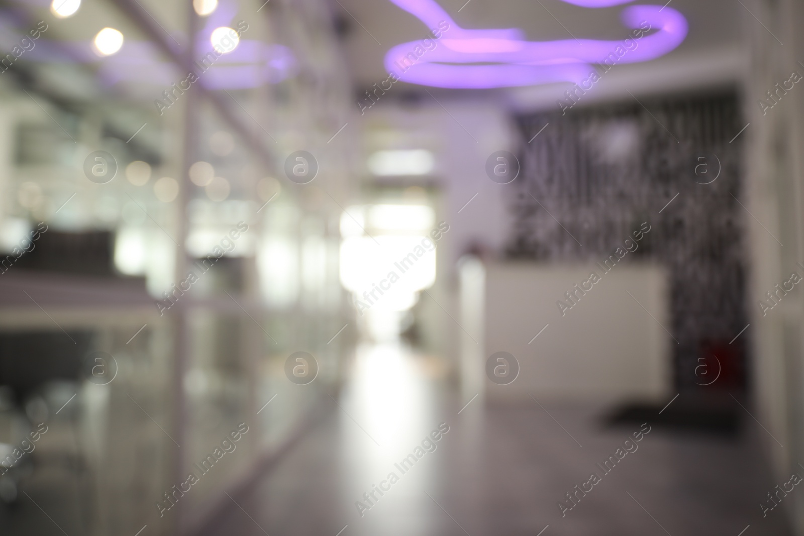 Photo of Blurred view of empty corridor in company