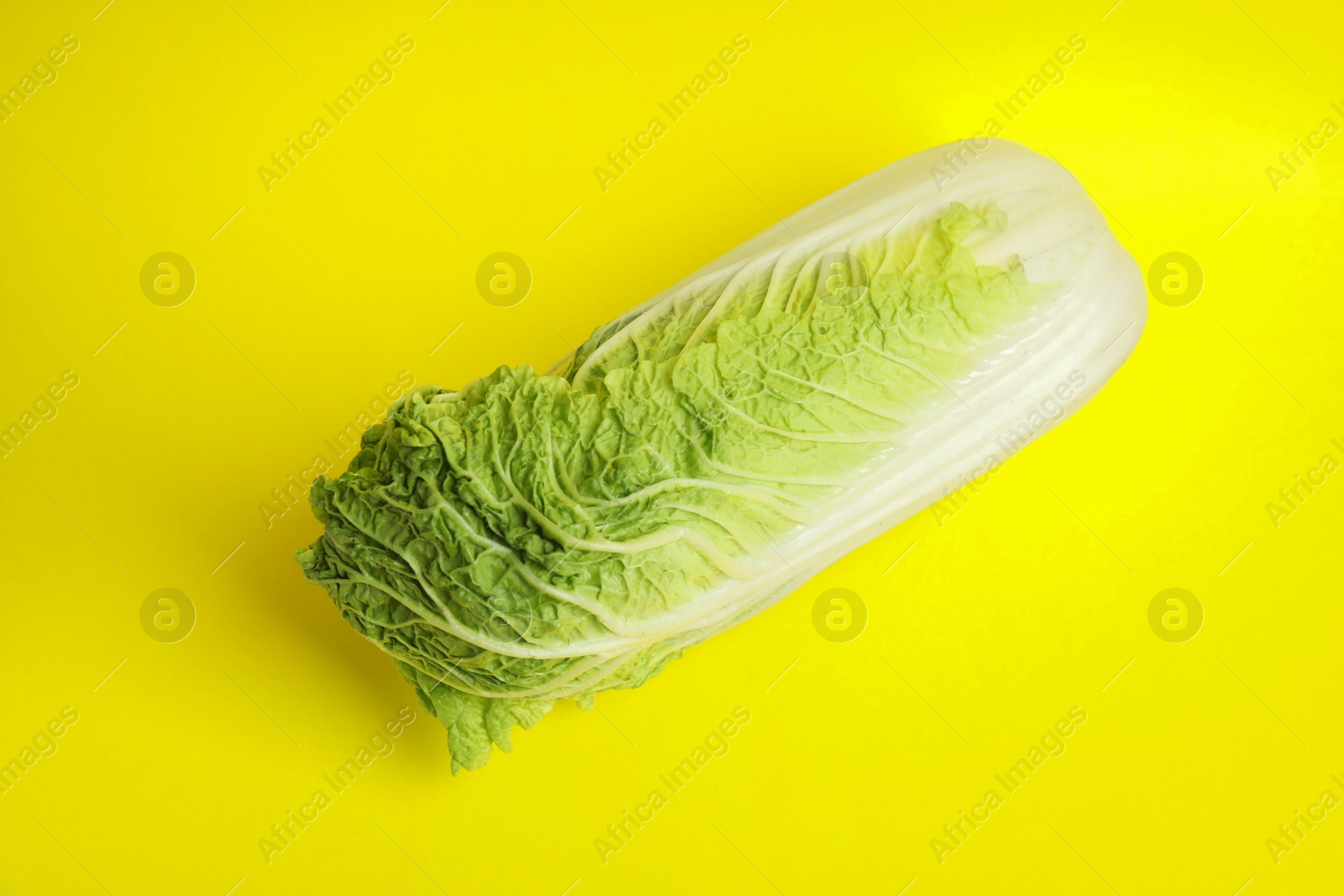 Photo of Fresh ripe cabbage on color background