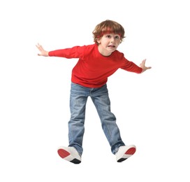 Happy little boy dancing on white background