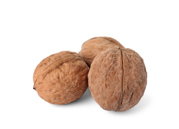 Walnuts in shell on white background. Organic snack