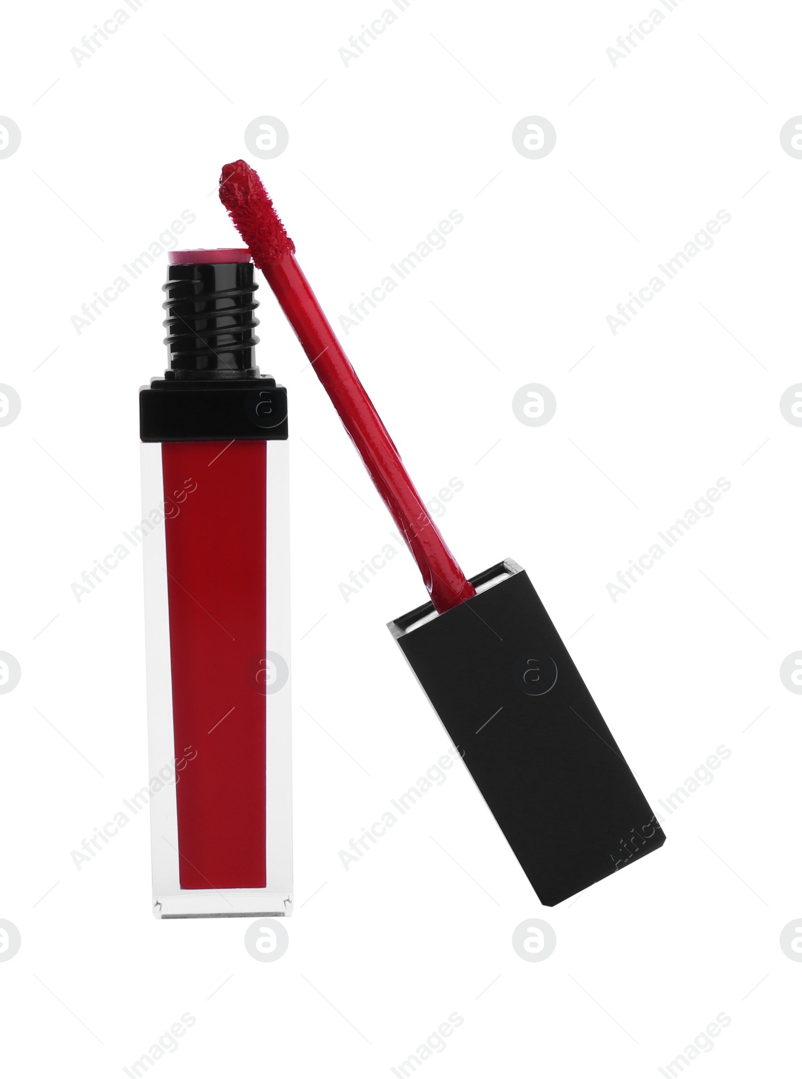 Photo of Red lip gloss and applicator isolated on white. Cosmetic product