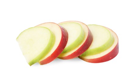 Photo of Slices of ripe apples isolated on white