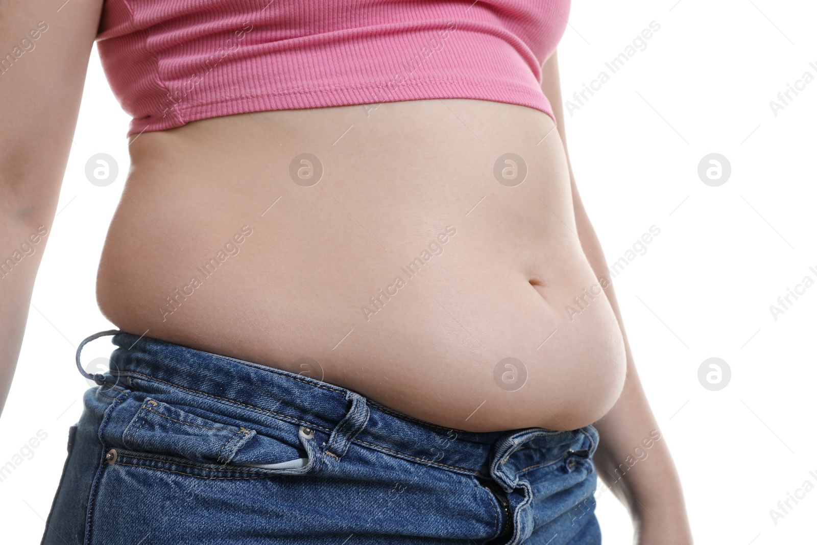 Photo of Woman with excessive belly fat on white background, closeup. Overweight problem