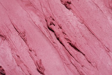 Texture of beautiful lipstick as background, closeup