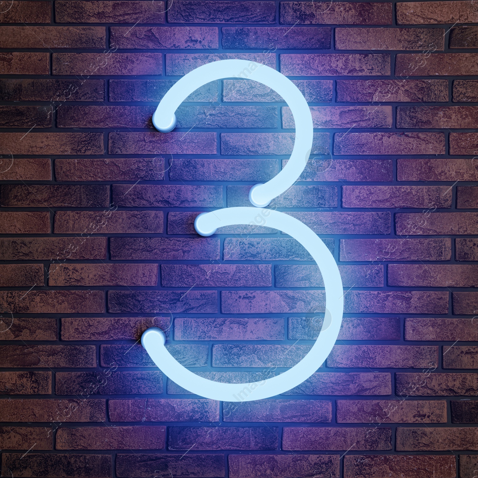 Image of Glowing neon number 3 sign on brick wall