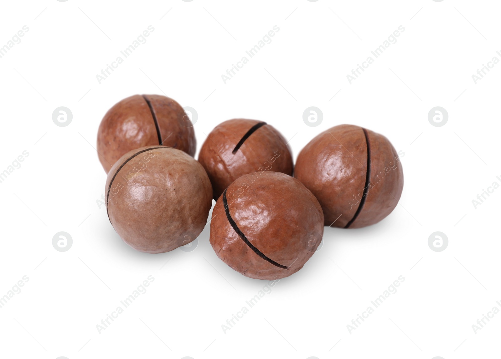 Photo of Delicious organic Macadamia nuts isolated on white