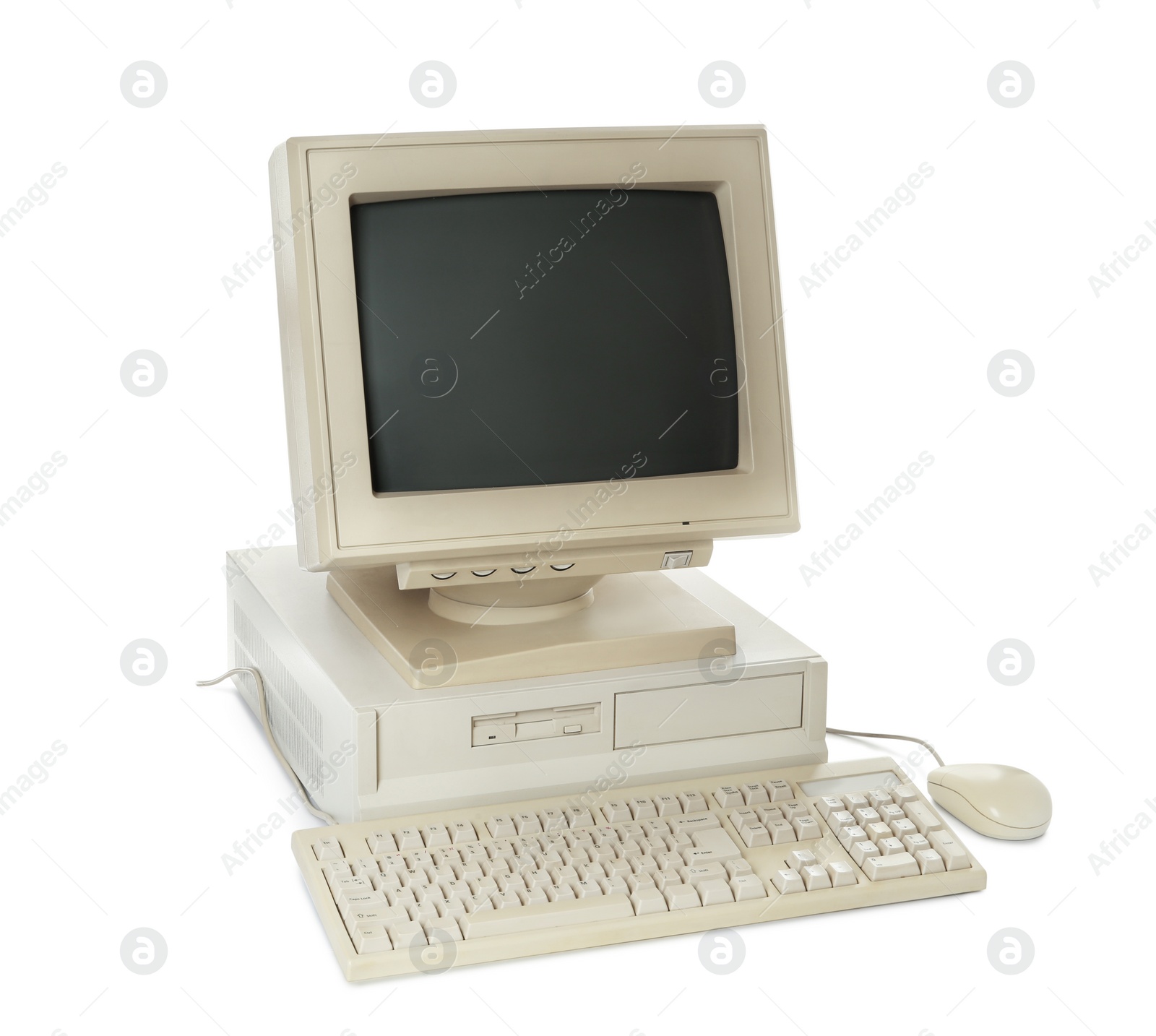 Photo of Old computer monitor, system unit, keyboard and mouse on white background