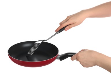 Photo of Woman with spatula and frying pan on white background, closeup