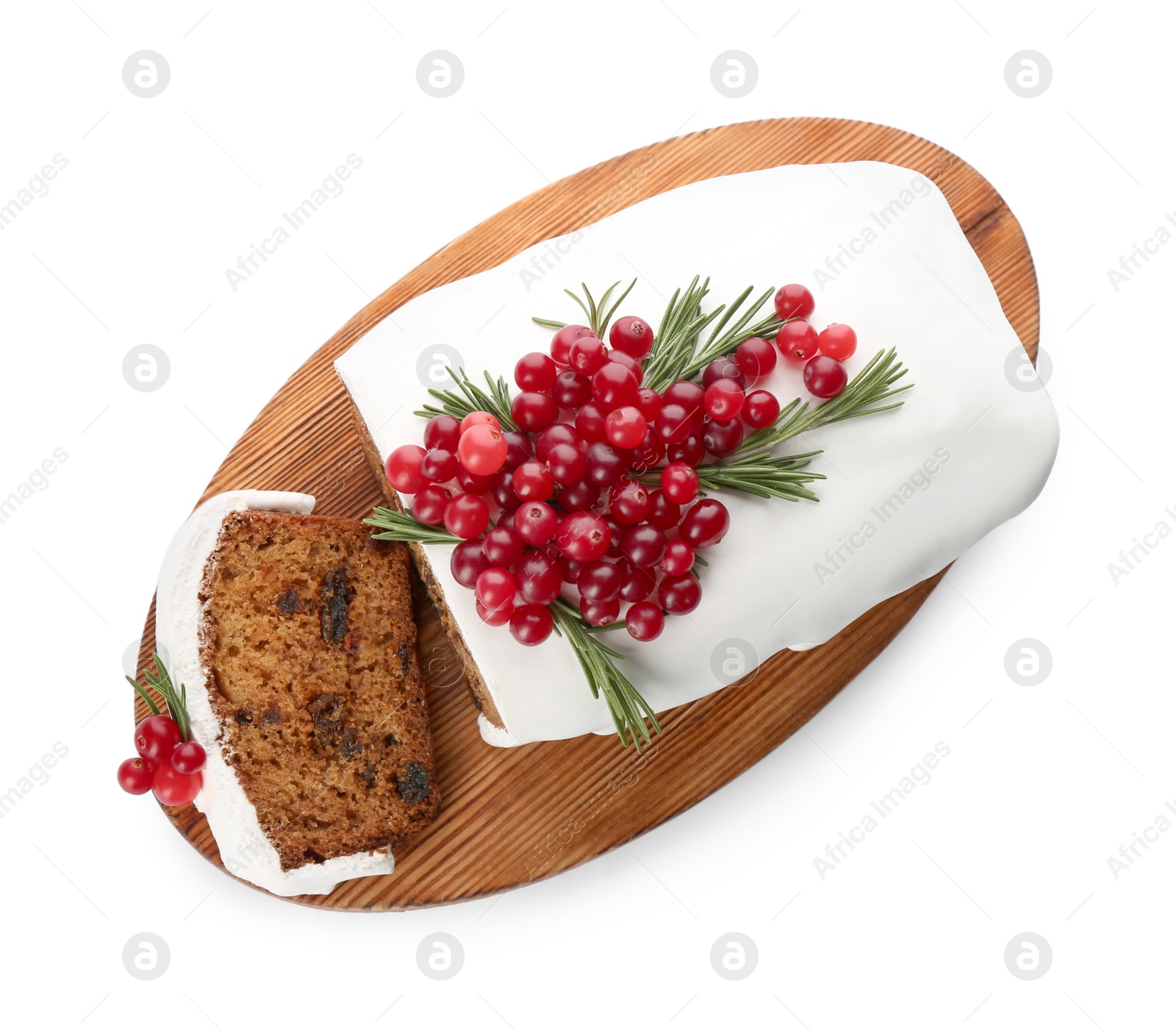 Photo of Traditional Christmas cake with cranberries and icing isolated on white, top view. Classic recipe