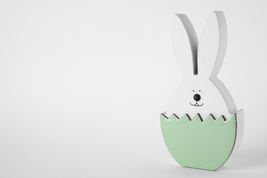 Easter bunny figure on white background. Space for text