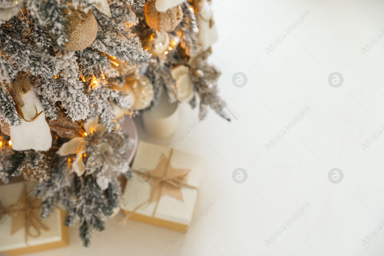 Photo of Beautiful Christmas tree, above view. Festive interior decoration