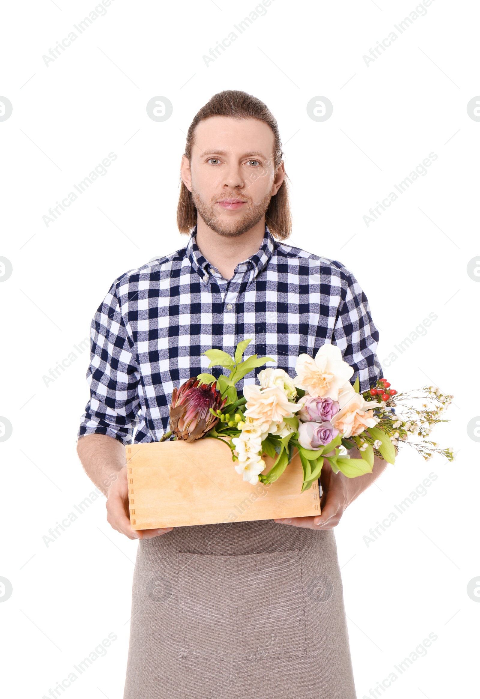 Photo of Male florist holding basket with flowers on white background