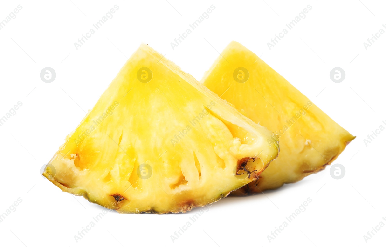 Photo of Slices of fresh pineapple isolated on white