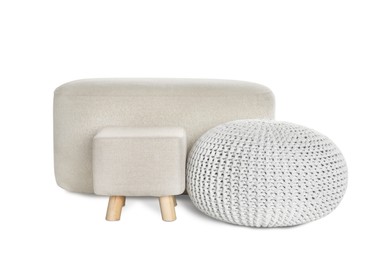 Photo of Different poufs on white background. Home design