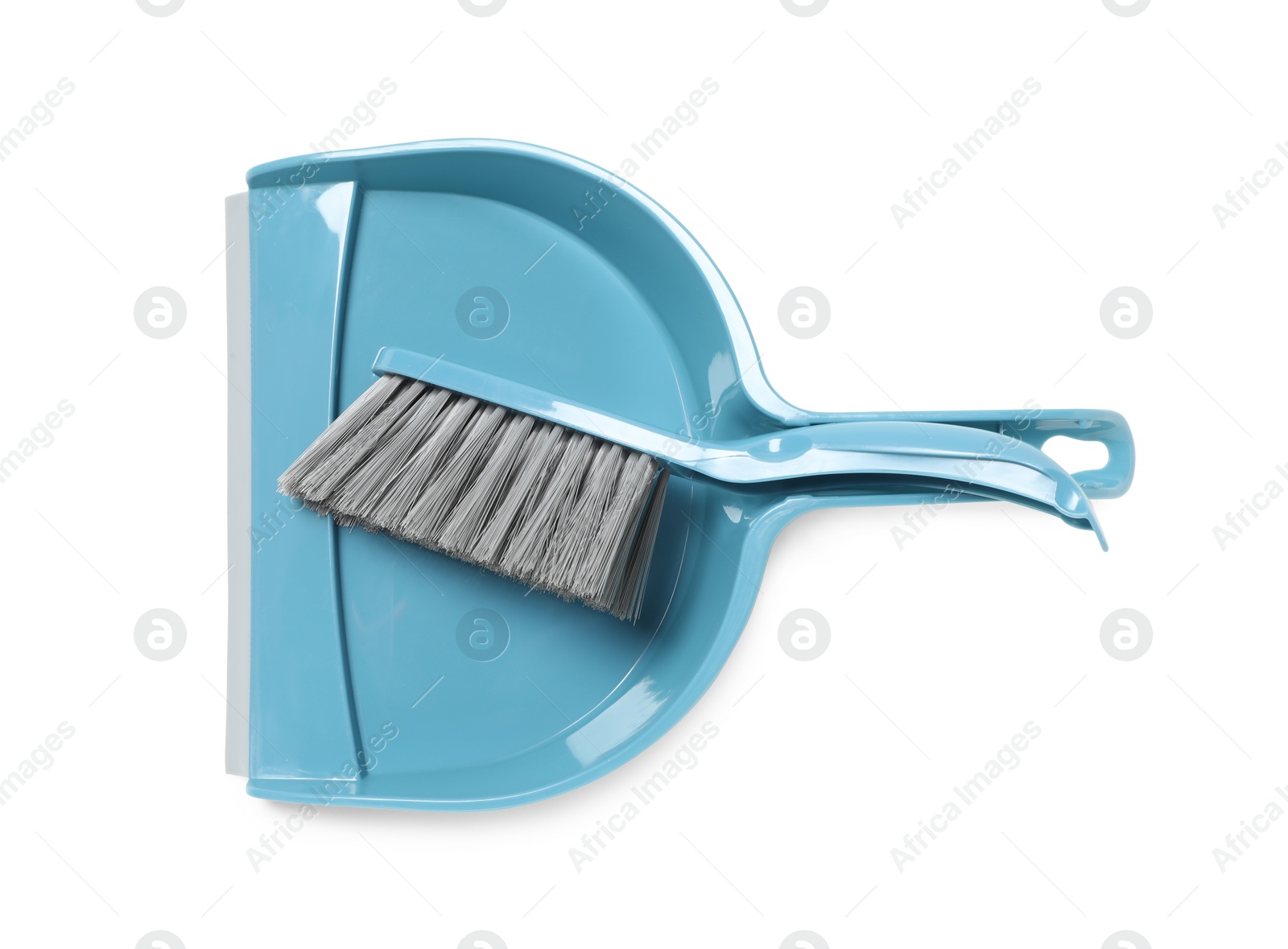 Photo of Plastic hand broom and dustpan isolated on white, top view