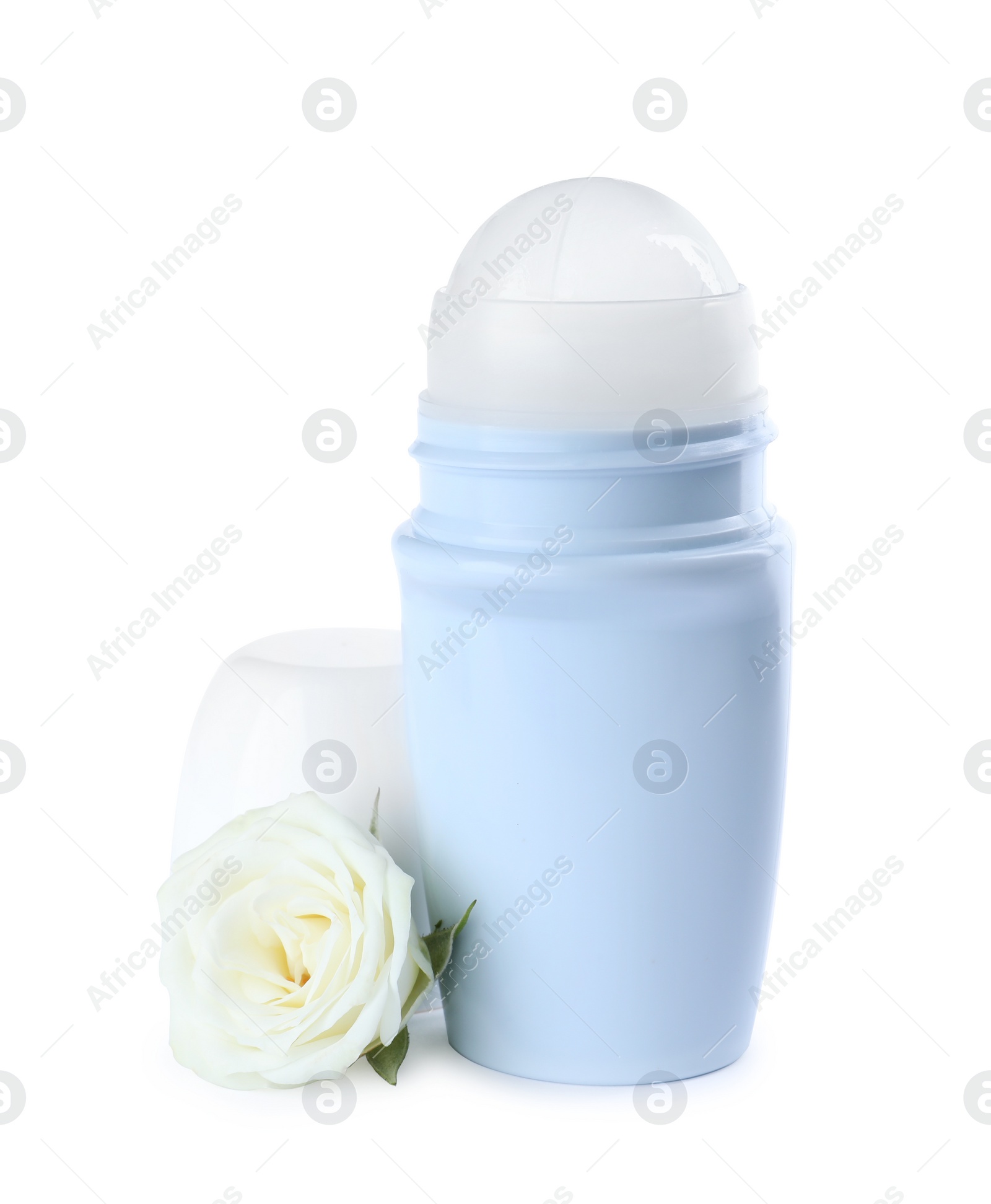 Photo of Roll-on female deodorant with rose on white background. Skin care