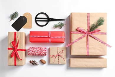 Flat lay composition with gift boxes on white background