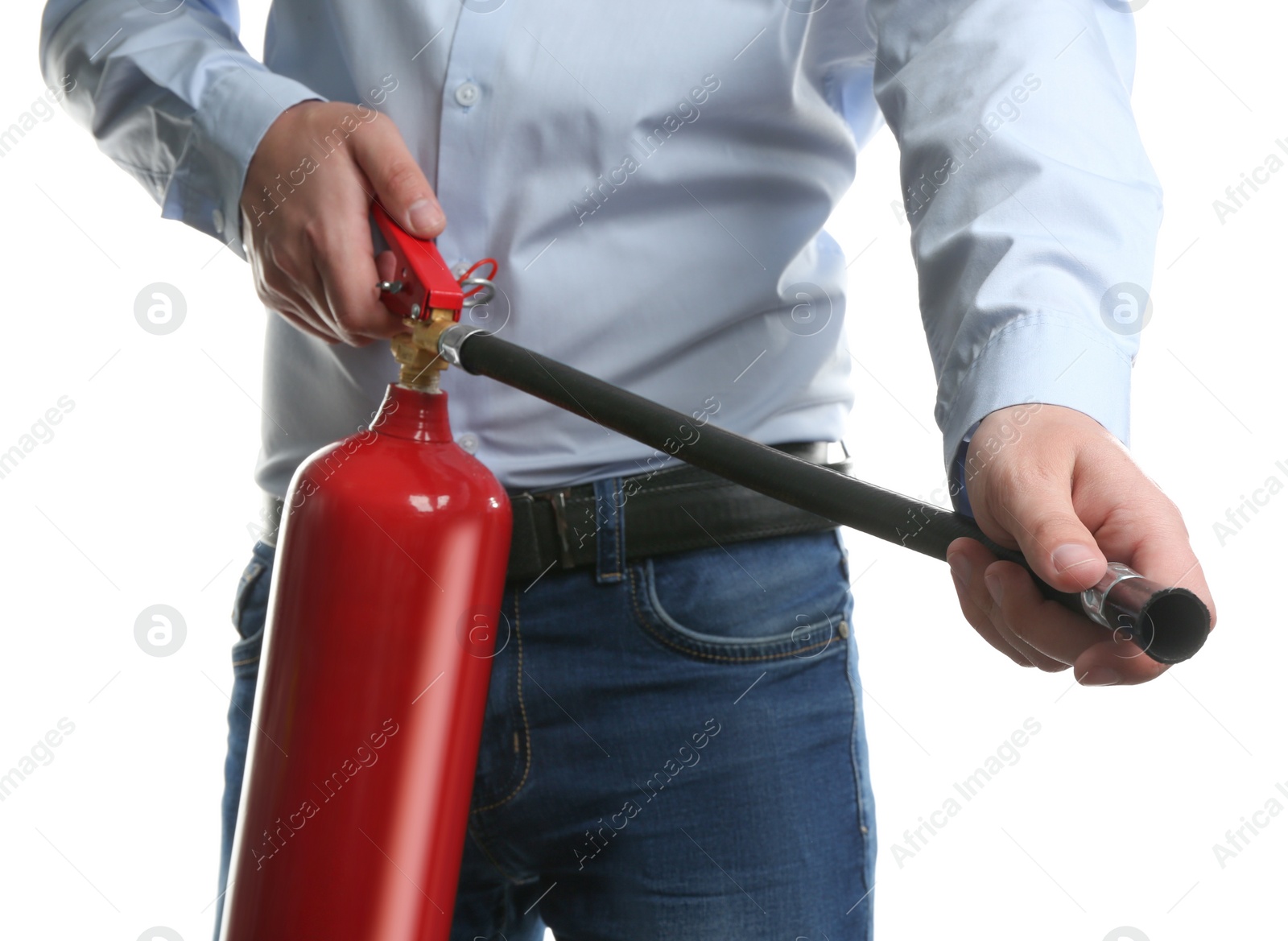 Photo of Man using fire extinguisher on white background, closeup