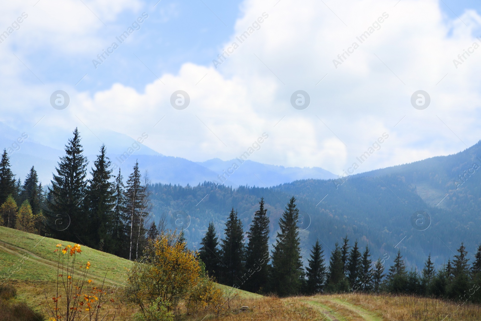 Photo of Beautiful landscape with blue sky over mountain slopes