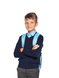 Little boy in stylish school uniform on white background