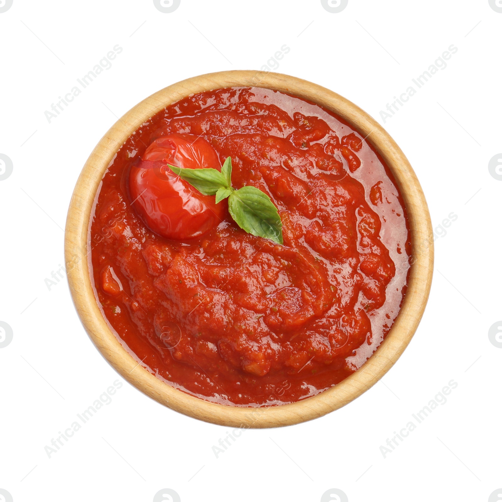 Photo of Homemade tomato sauce and basil in bowl isolated on white, top view