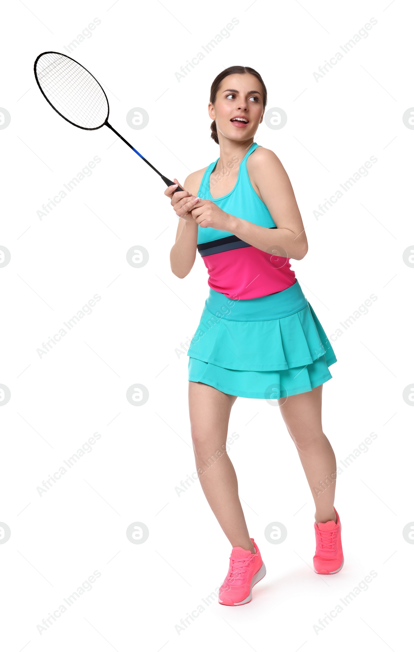 Photo of Young woman playing badminton with racket on white background