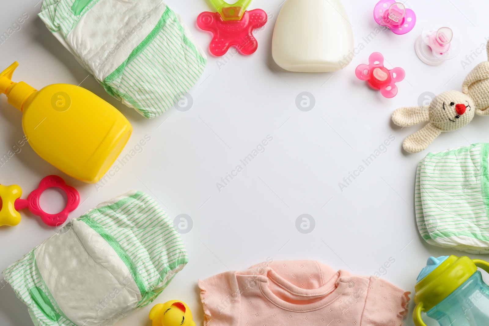 Photo of Flat lay composition with baby accessories and space for text on white background