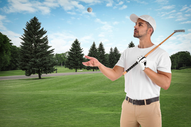 Image of Young man with golf club and ball on green course. Space for design