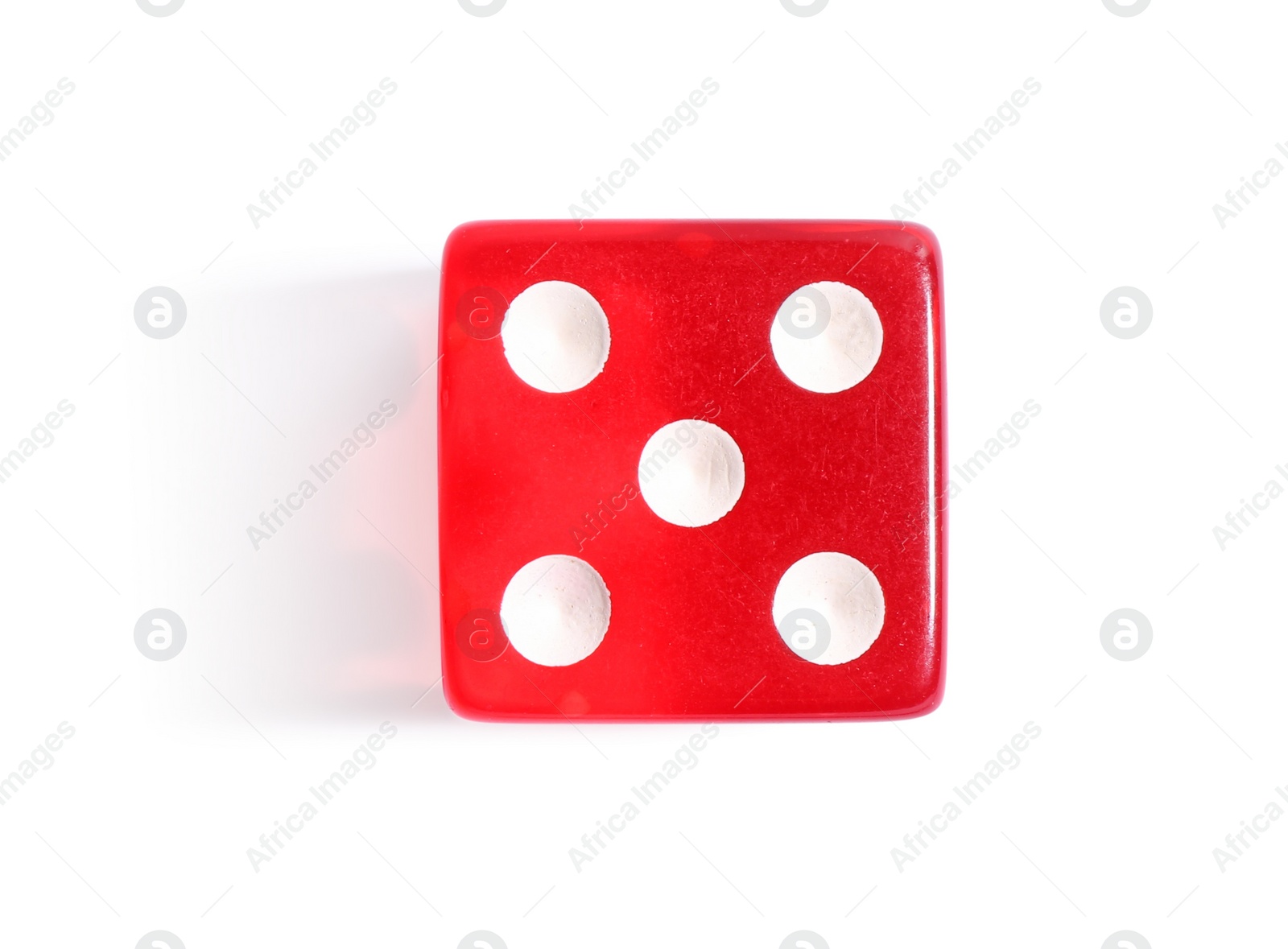 Photo of One red game dice isolated on white, top view