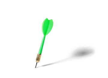 Photo of Green dart arrow for game on white background