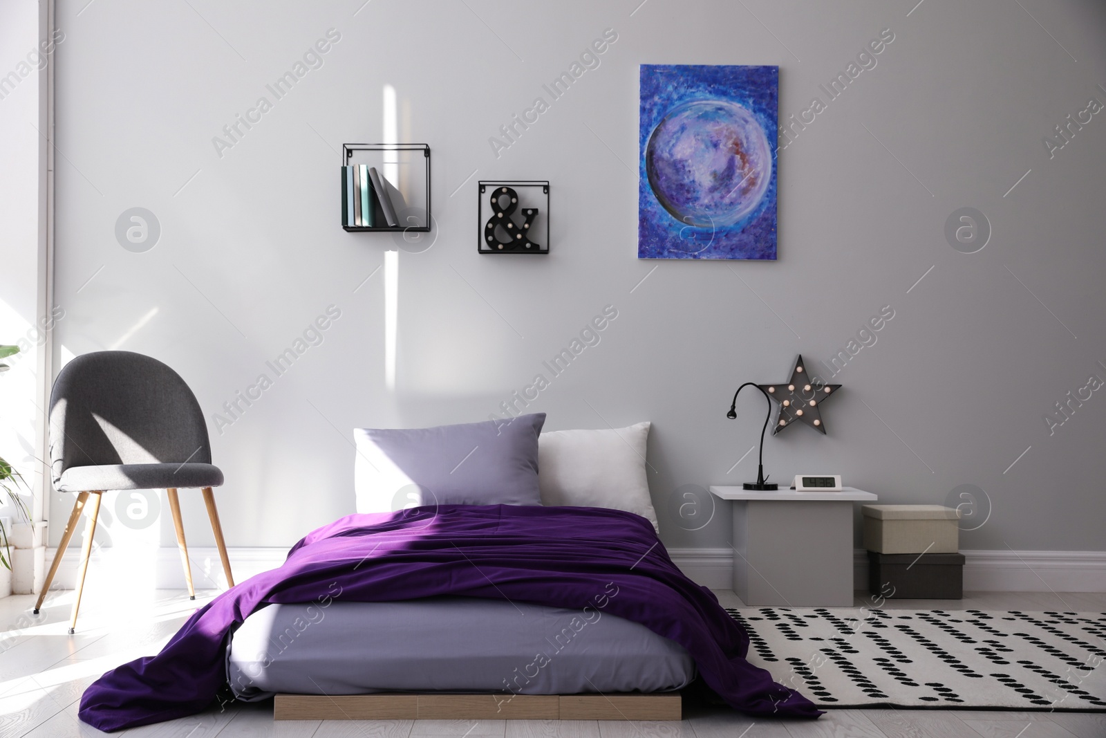 Photo of Modern teenager's room interior with comfortable bed and stylish design elements