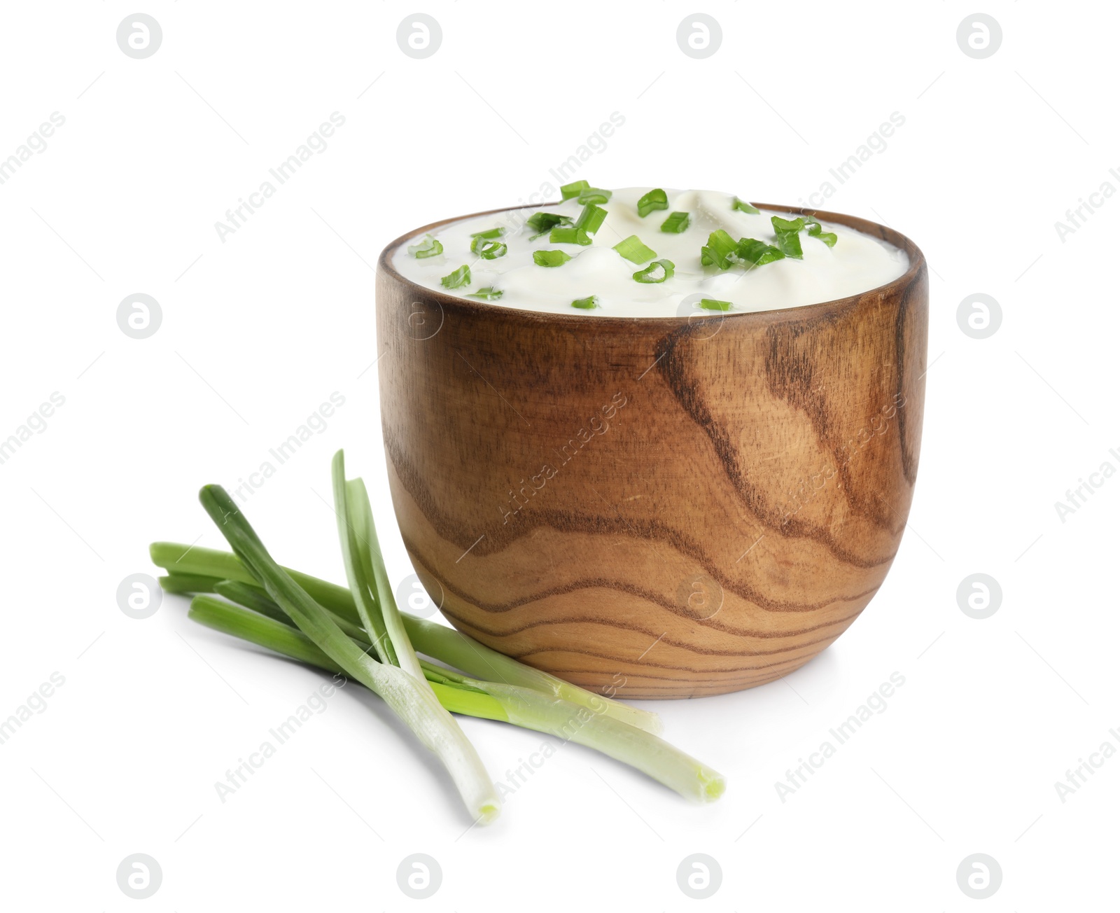 Photo of Fresh sour cream with onion on white background