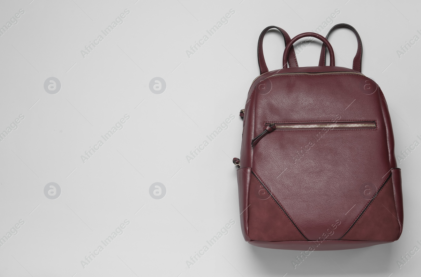 Photo of Stylish urban backpack on white background, top view